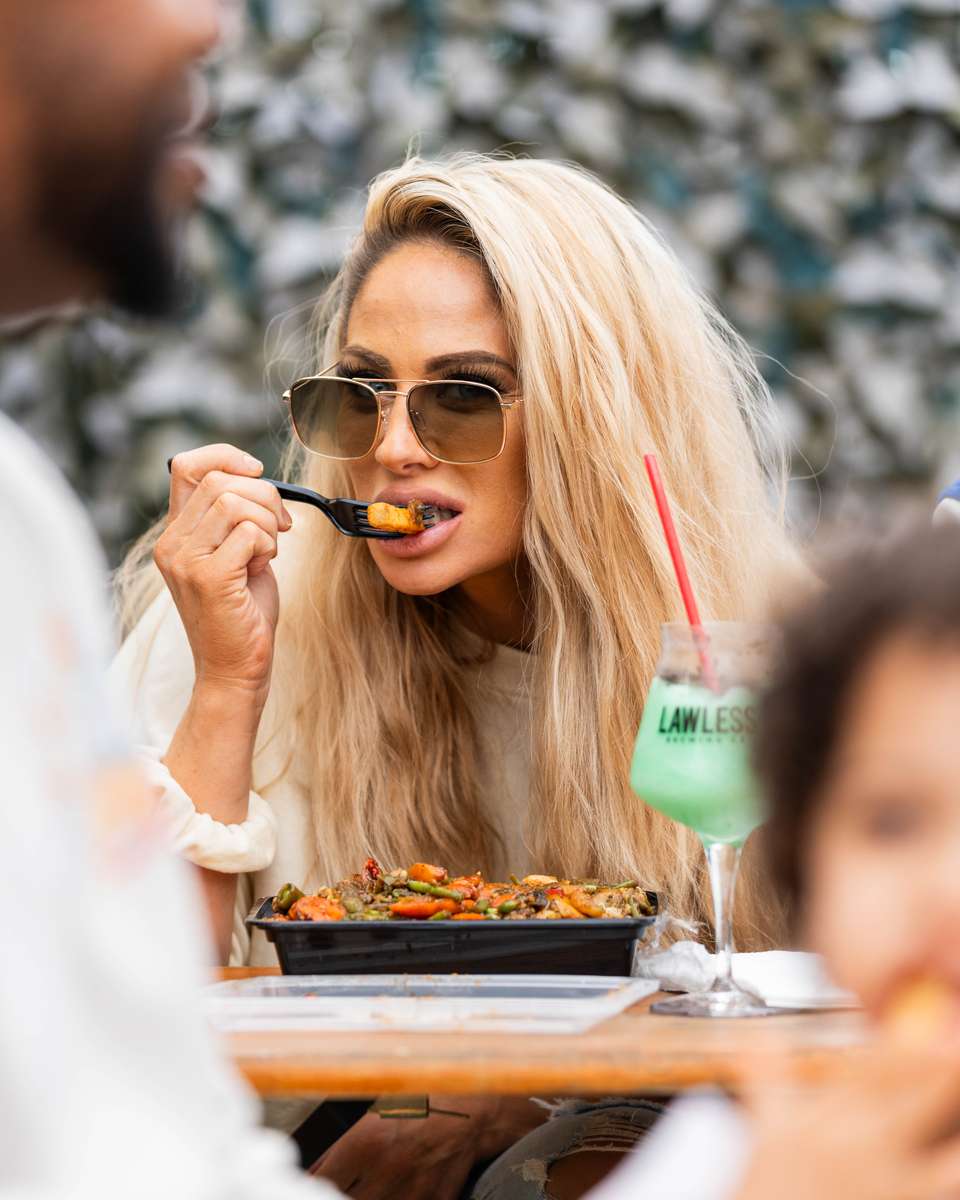 UCLA catering food truck — guests enjoying FryDay loaded fries at a campus-style outdoor event in Los Angeles