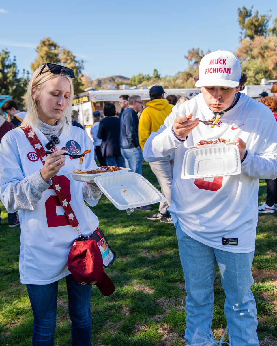 Guests enjoying FryDay loaded fries at a San Fernando Valley quinceañera celebration
