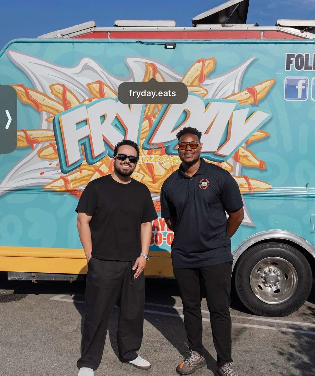 FryDay Food Truck team in front of the truck, illustrating family owned food truck franchise ownership