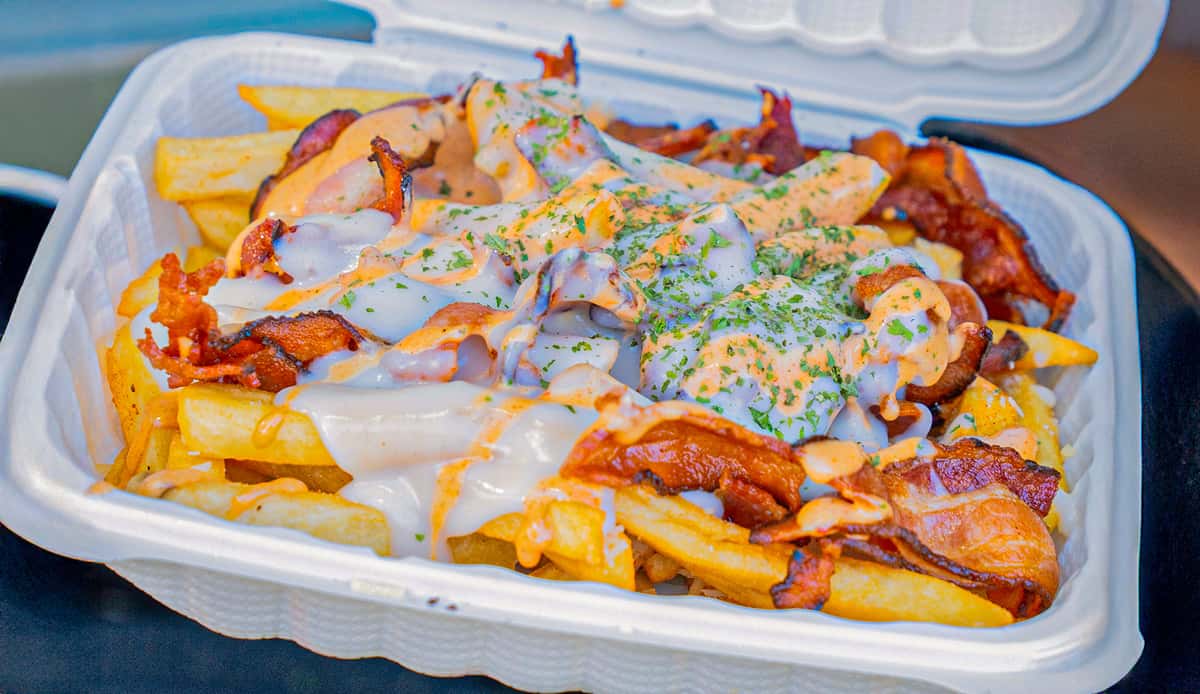 Close-up of FryDay loaded fries served at a first responder appreciation catering event in Los Angeles