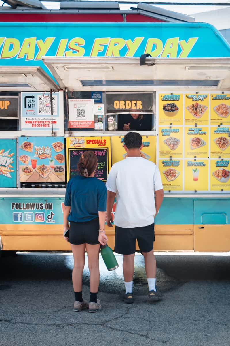 FryDay Food Truck catering a Dia de los Muertos community gathering in Los Angeles