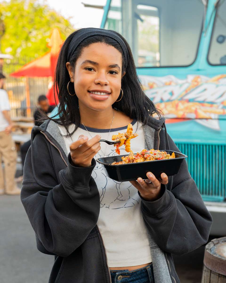 Guests enjoying FryDay loaded fries at a Sherman Oaks backyard party in LA