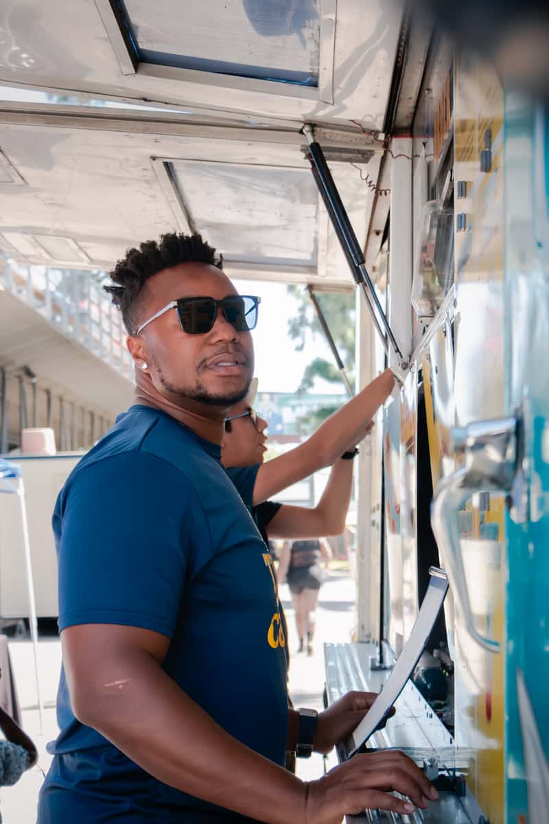 FryDay food truck crew serving guests at a Los Angeles street fair and community event