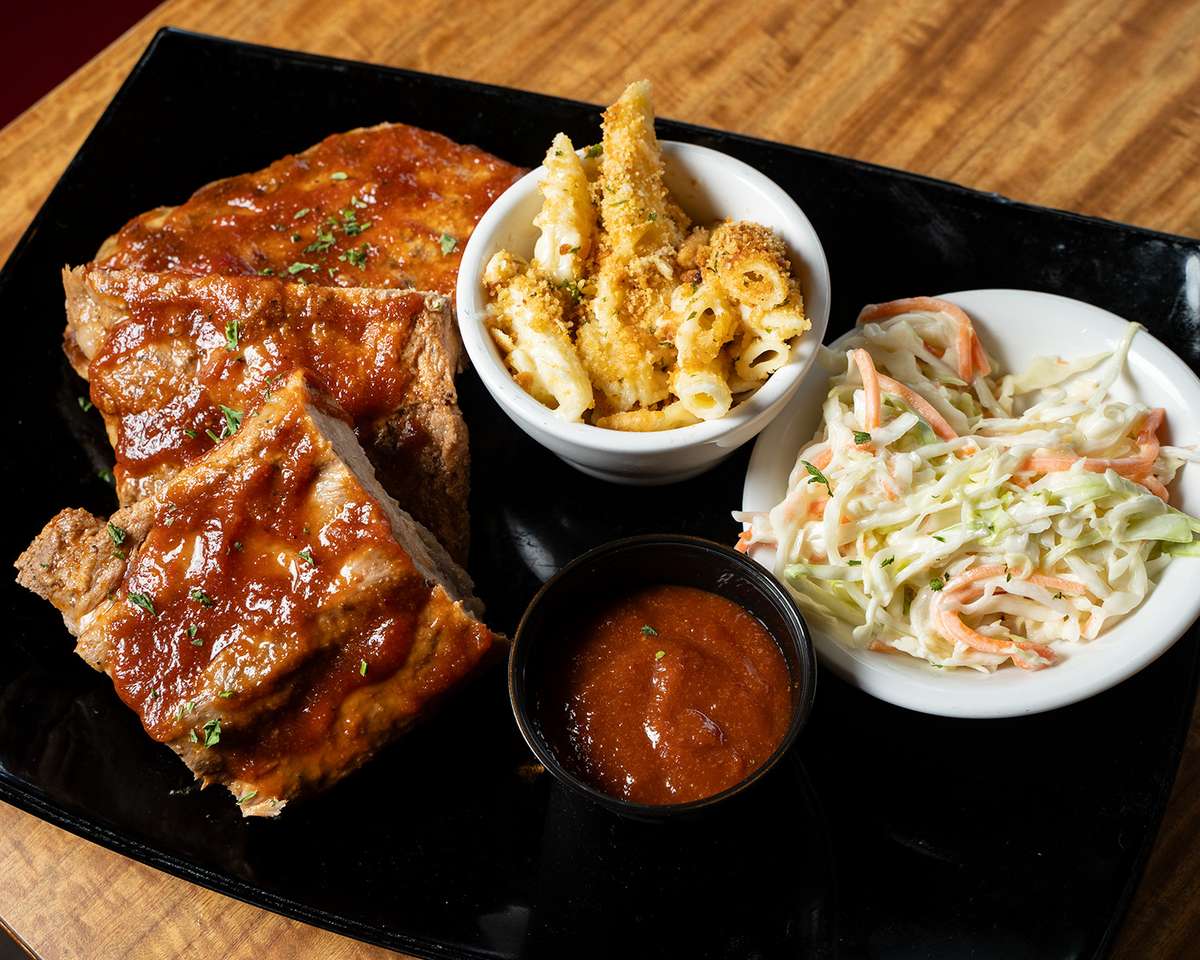 rack of ribs, house-made bbq sauce, mac & cheese, coleslaw, and warm cornbread