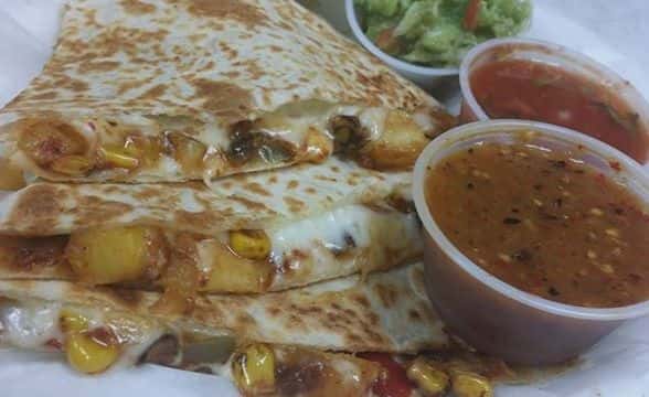 Quesadillas with cheese, tomatoes, corn and dipping sauce