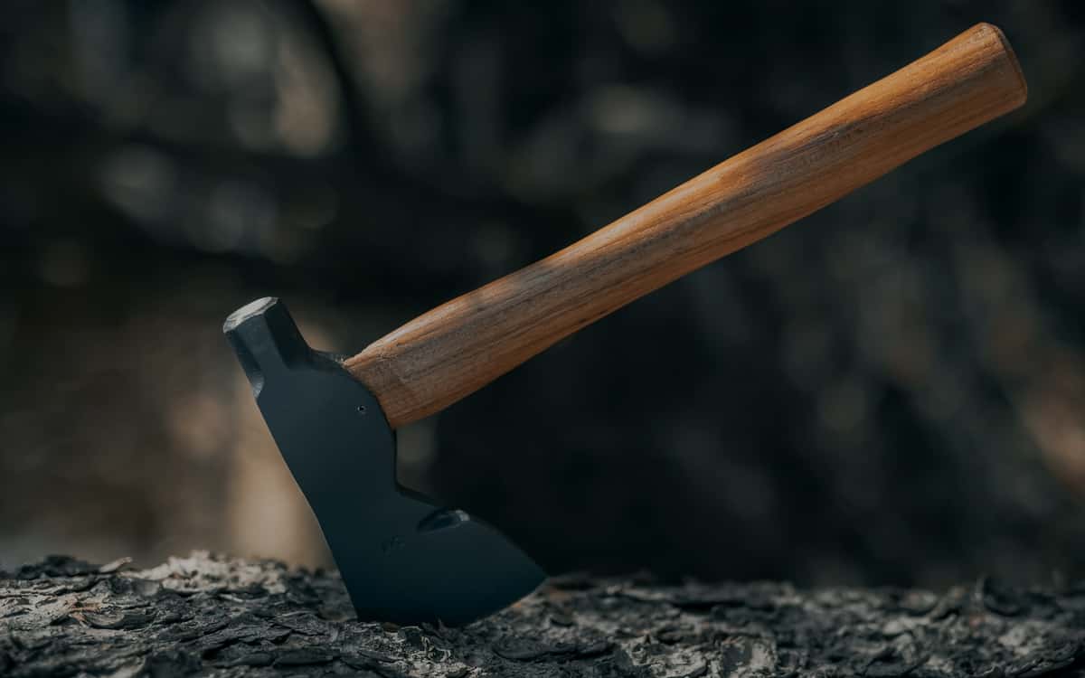 Axe in a log