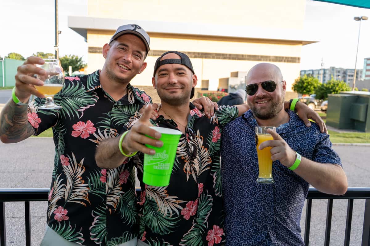 three-men-holding-drinks