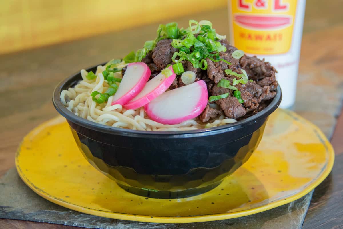 Beef noodle bowl with sliced radish and green onion at L&L Hawaiian BBQ