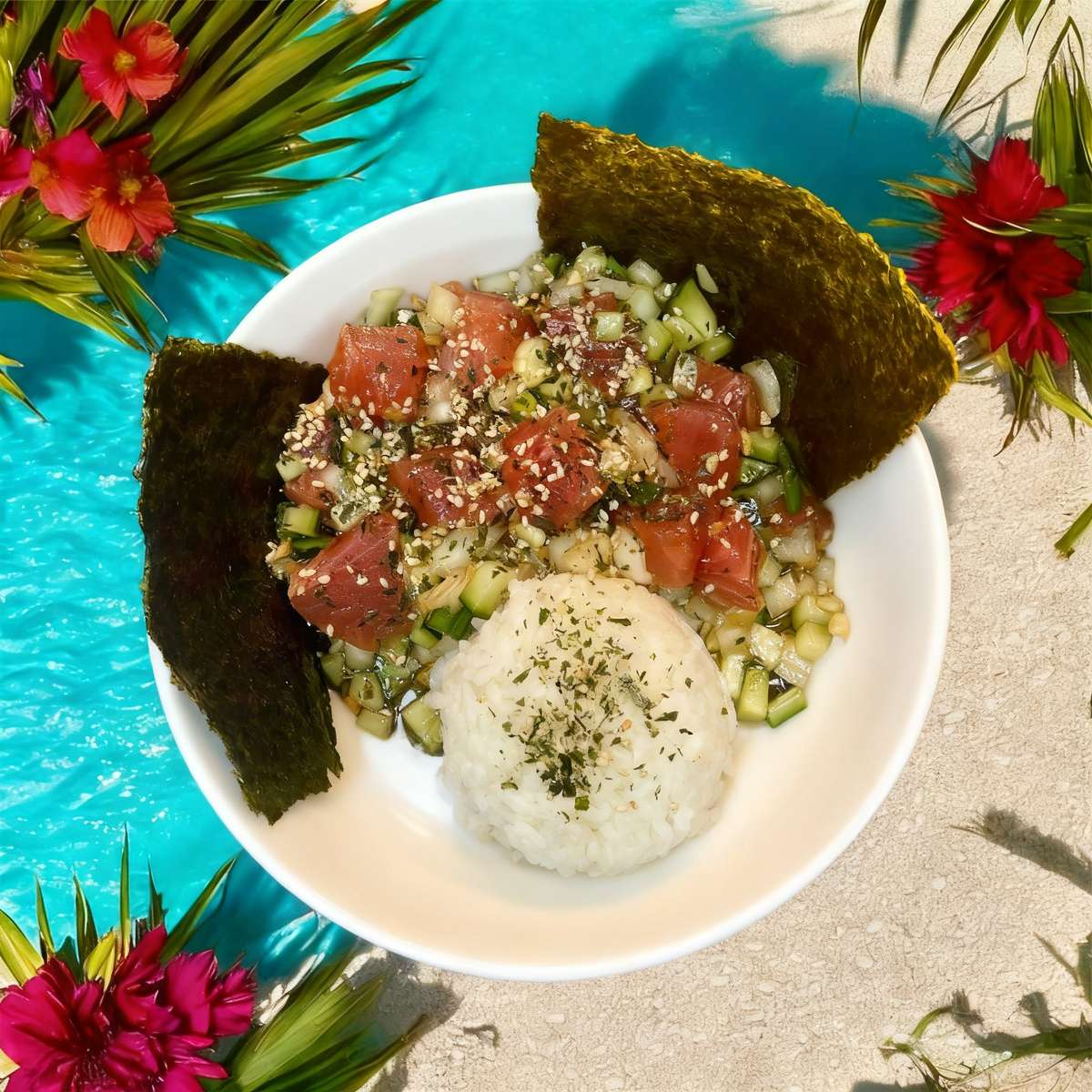 Ahi Tuna Poke bowl is a vibrant Hawaiian-inspired dish built around fresh, sushi-grade raw tuna served with a scoop of rice with diced cucumbers, onions and sprinkled with Furikake.