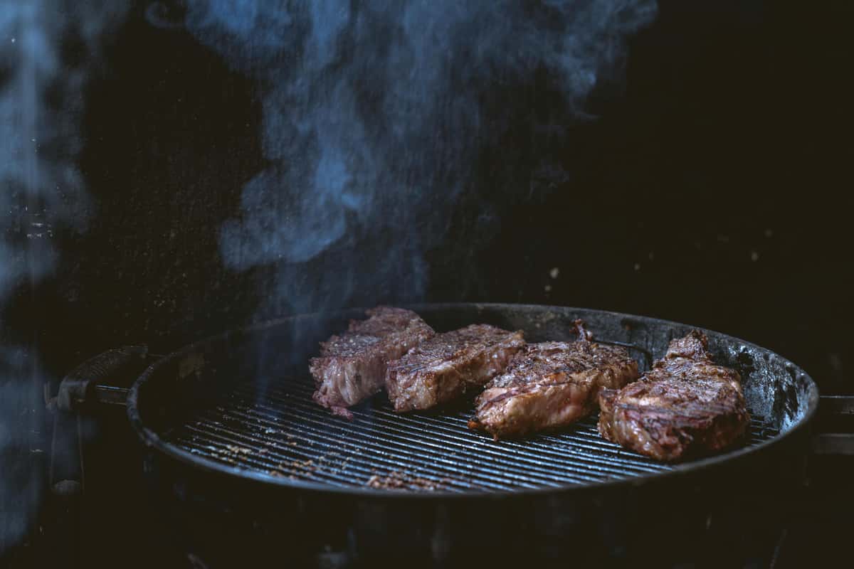 steaks on grill