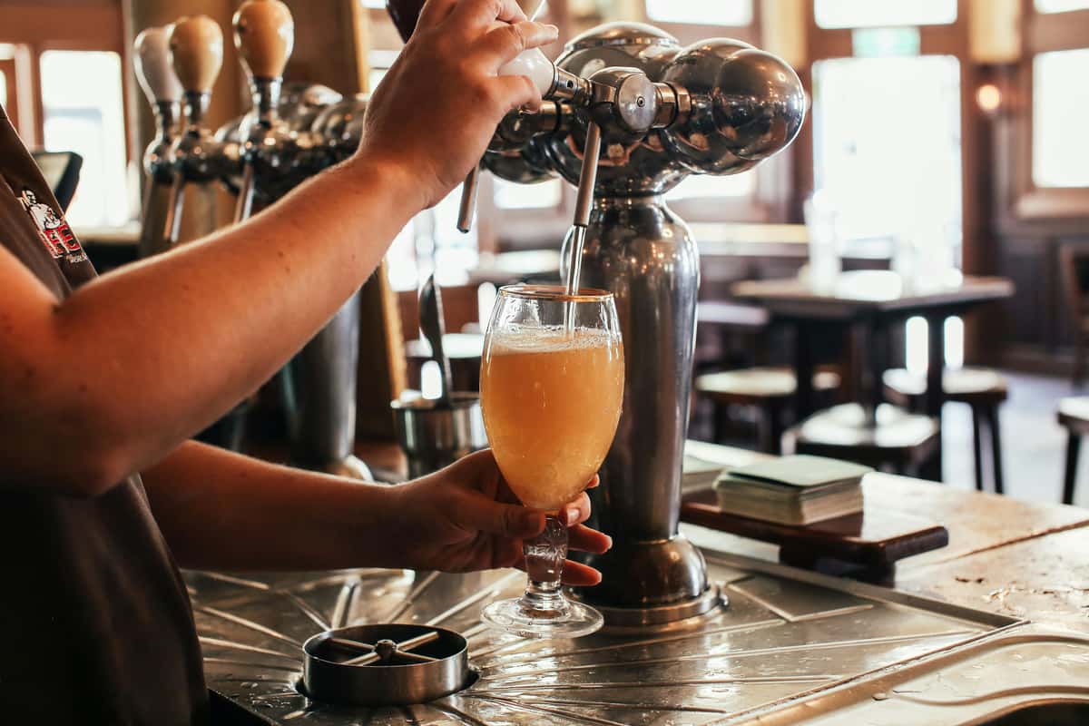 Pouring beer from beer tap