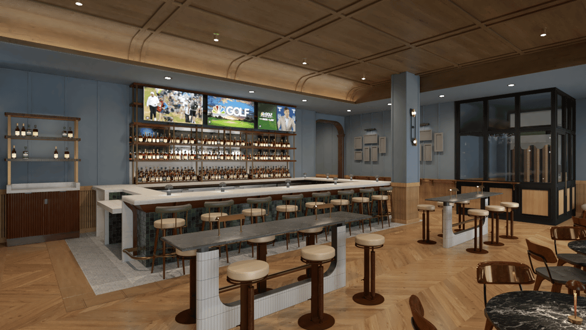 Upscale sports bar with a long marble bar, high stools, backlit liquor shelves, and large TVs displaying live games in a contemporary restaurant setting