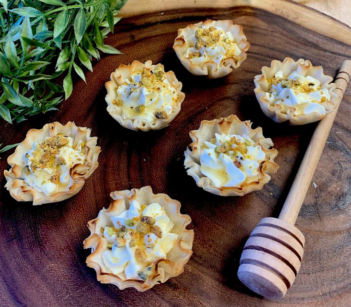Honey Goat Cheese Tartlets served on a wooden board