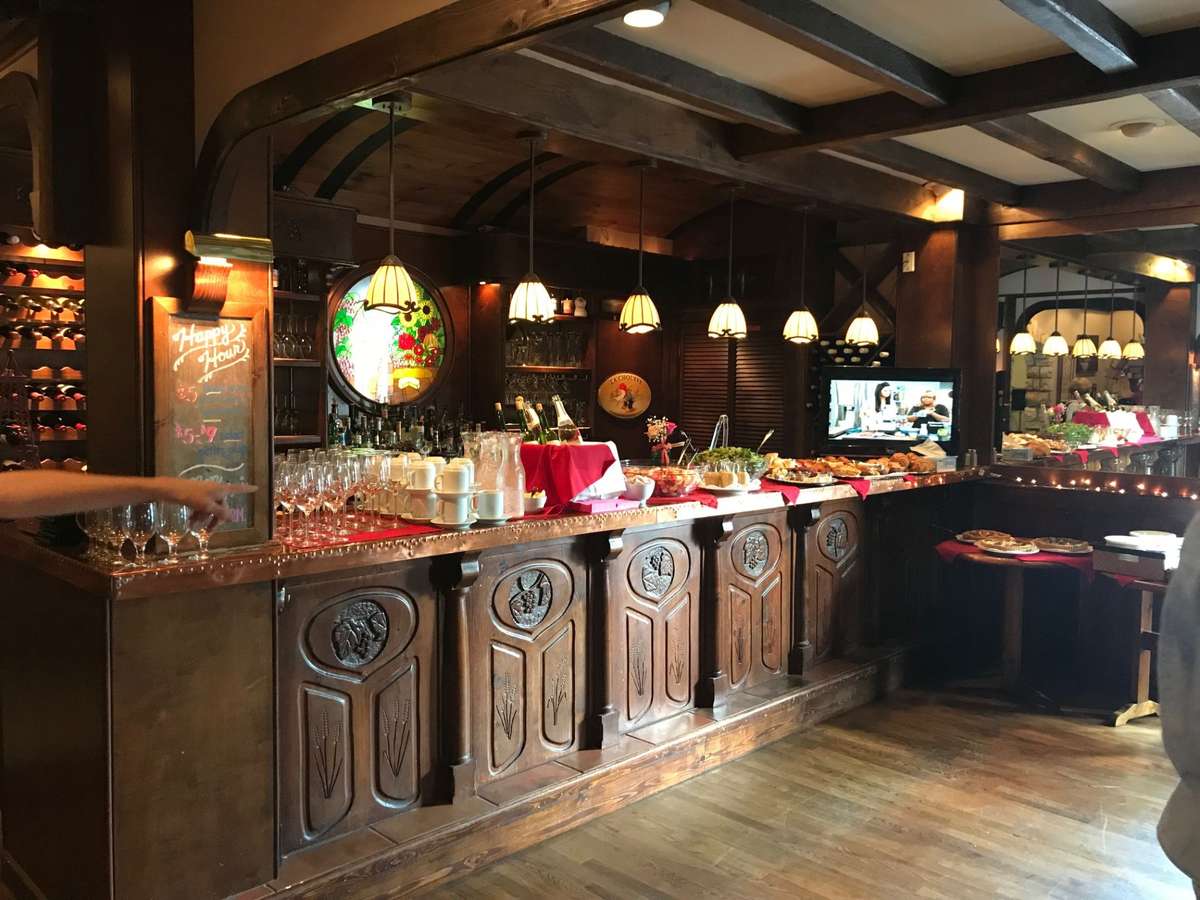 Bar area with an assortment of food on the bar-top