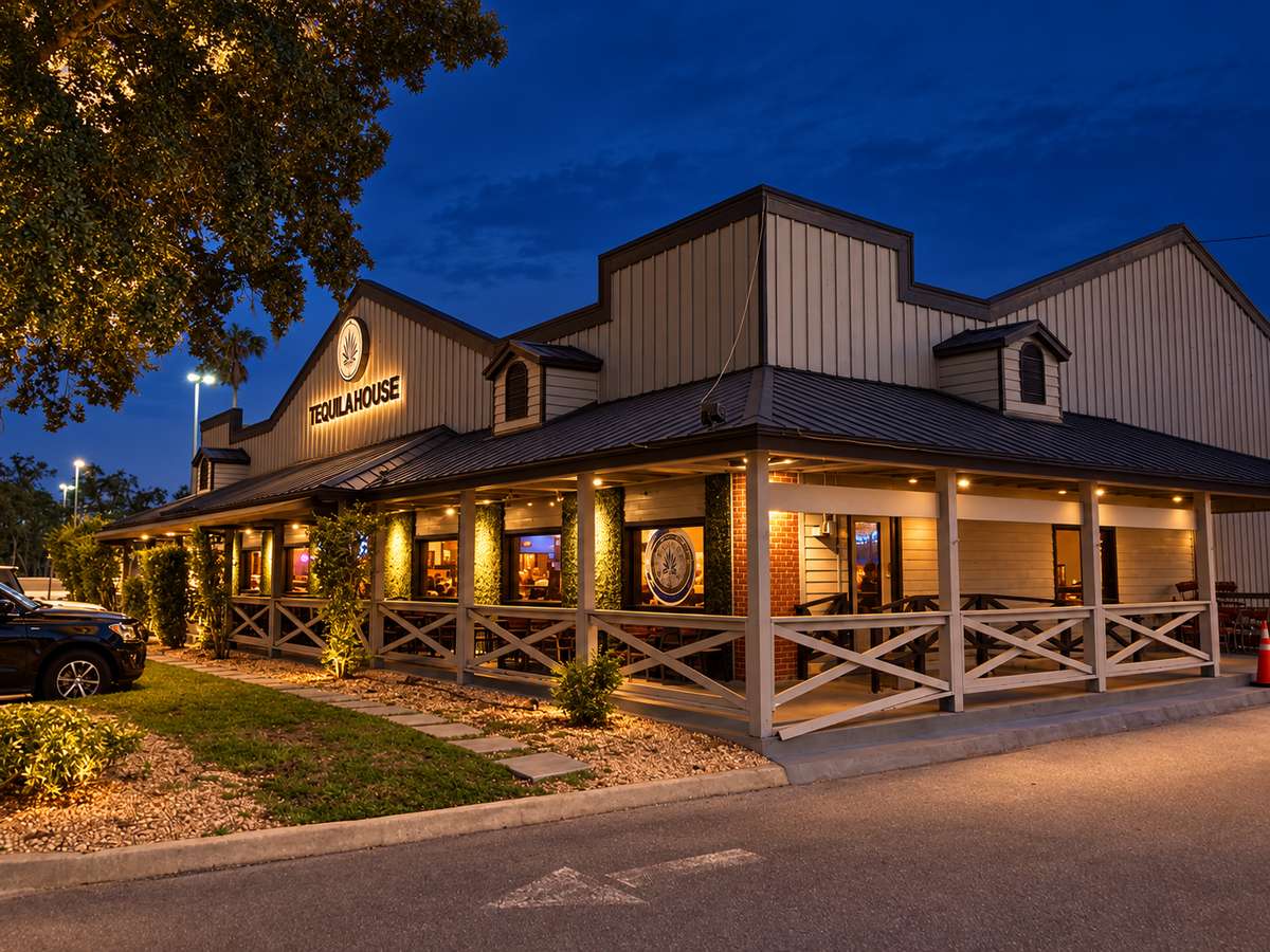 Melbourne restaurant exterior with warm evening lighting.