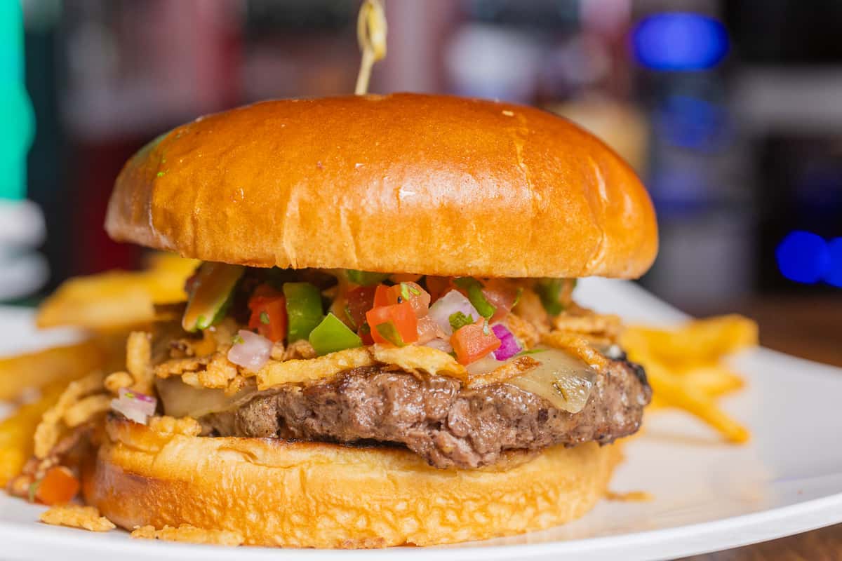 Southwest-style burger topped with fresh pico de gallo and served with fries.