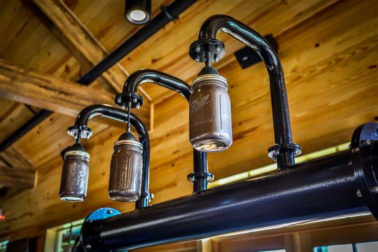pipes with mason jars attatched