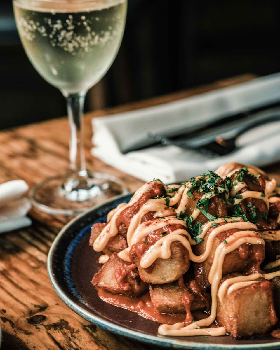 Papatas Bravas are a Spanish staple, reimagined here at El Raval