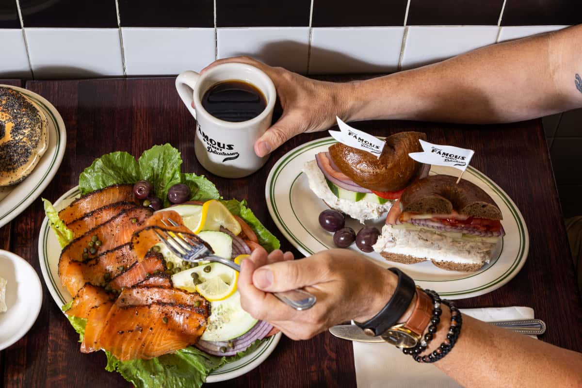 Yom Kippur meal at Famous 4th Street Delicatessen featuring pastrami-style nova lox and bagel with coffee — authentic Jewish-style deli food in Philadelphia.
