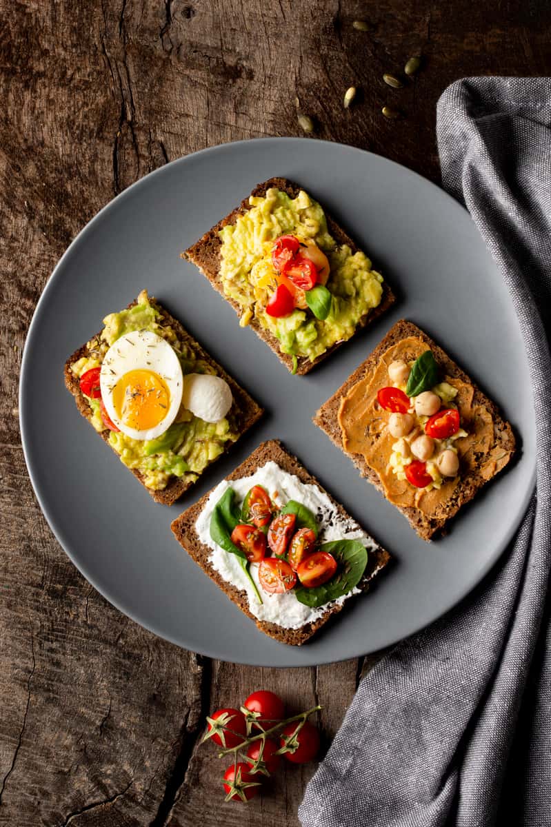 various toasts with veggie cream with cloth