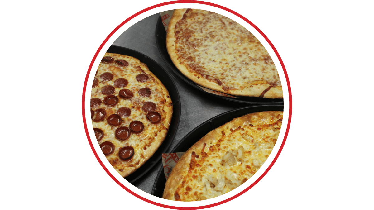 Pepperoni, cheese, and specialty pizzas freshly baked and served on trays at a casual pizzeria.