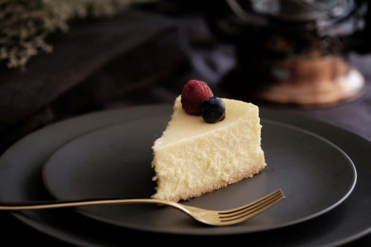 cheesecake on a plate with fork