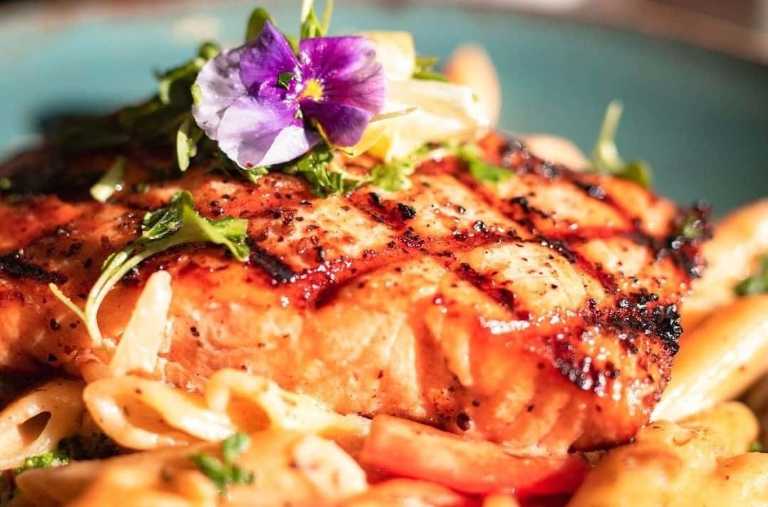 Wild caught salmon served with garlic mashed new potatoes & Broccolini w/Tropical Glaze or Garlic Herb with creole sauce.
