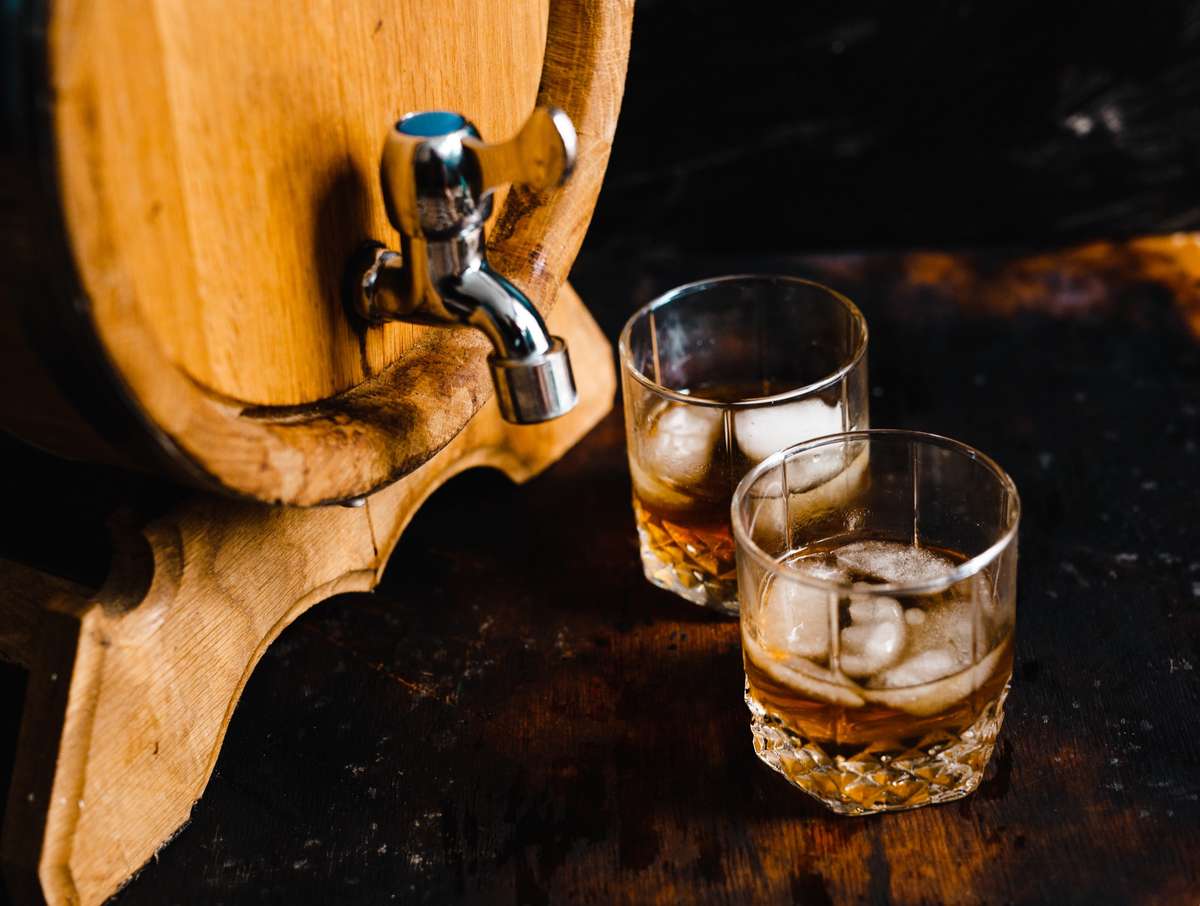 Whiskey barrel and shot glasses