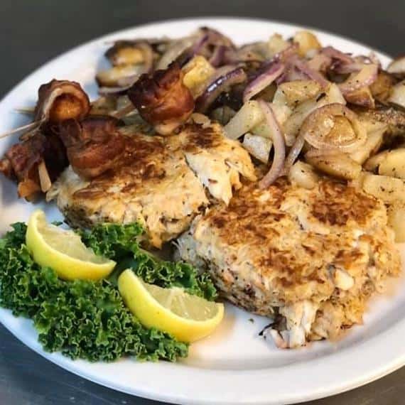 breaded pork chops with potatoes and onions
