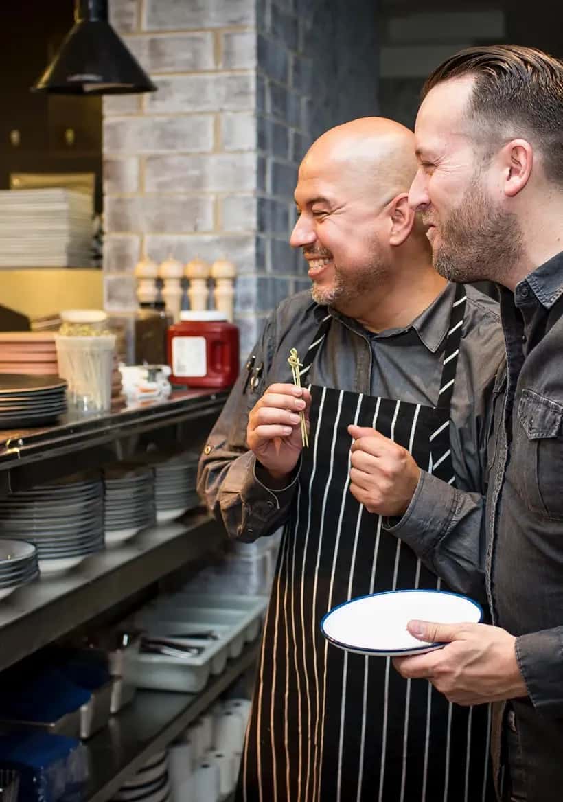 team members collaborating in kitchen