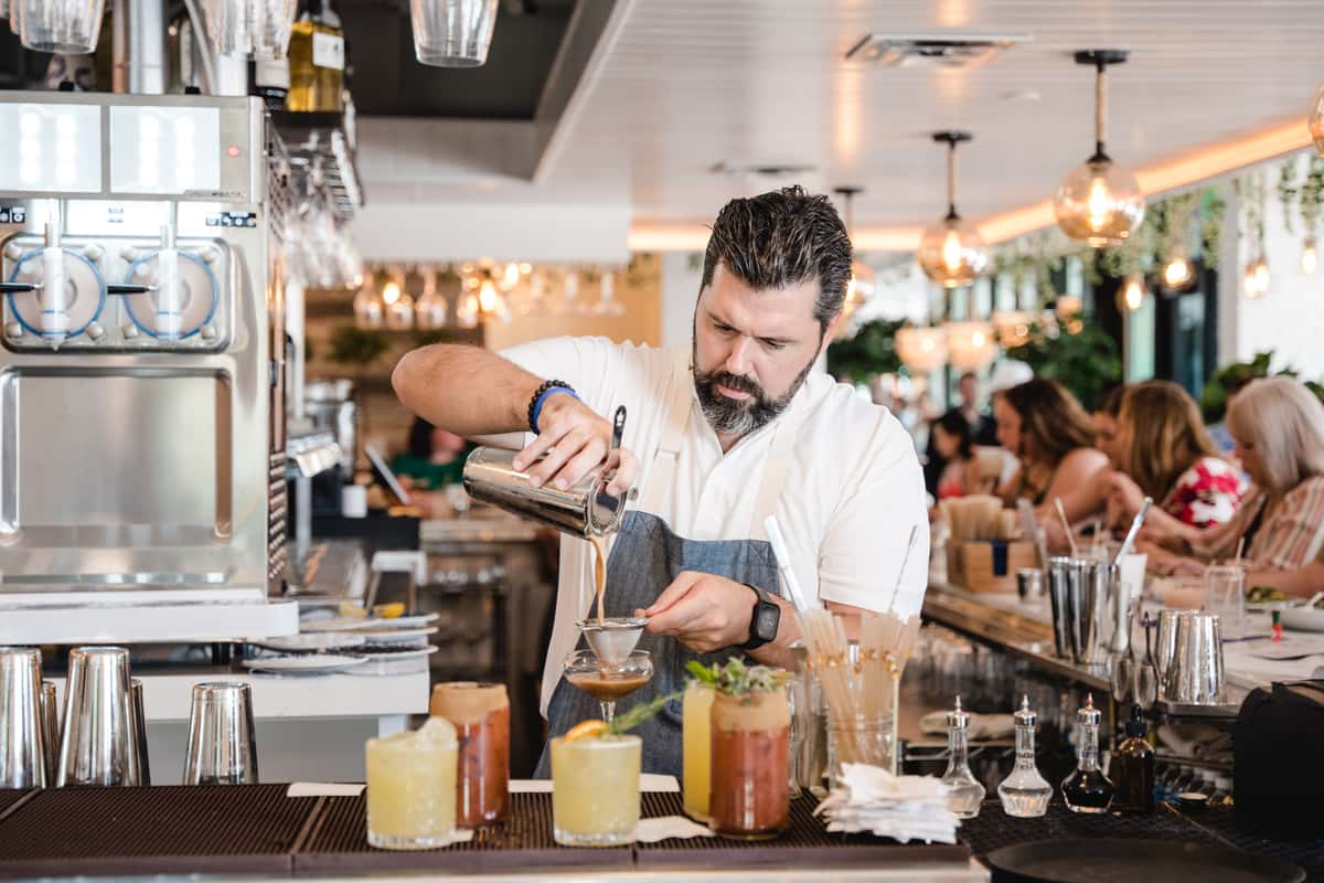 bartender pouring drinks