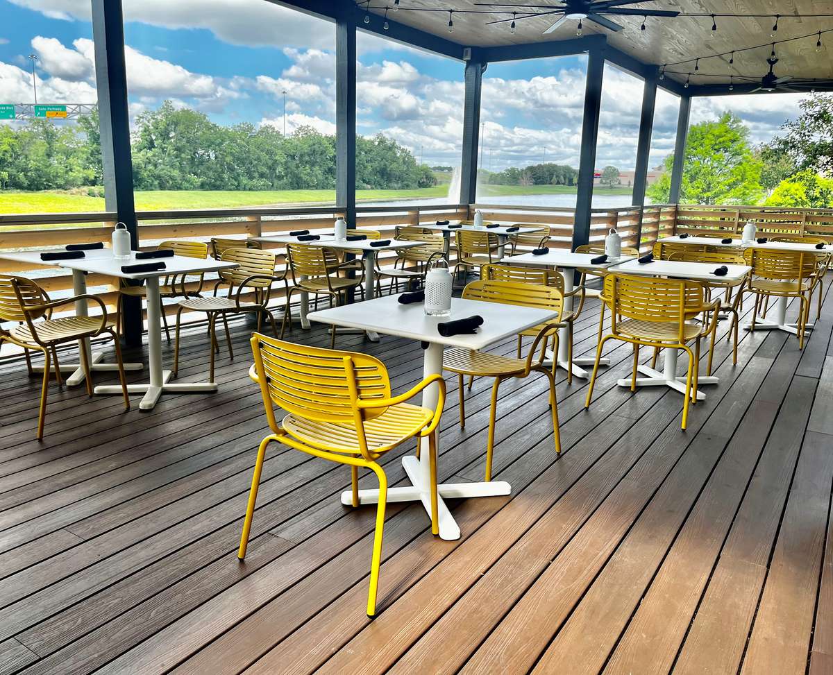 Prati Italia outdoor pavilion seating, lakeside view