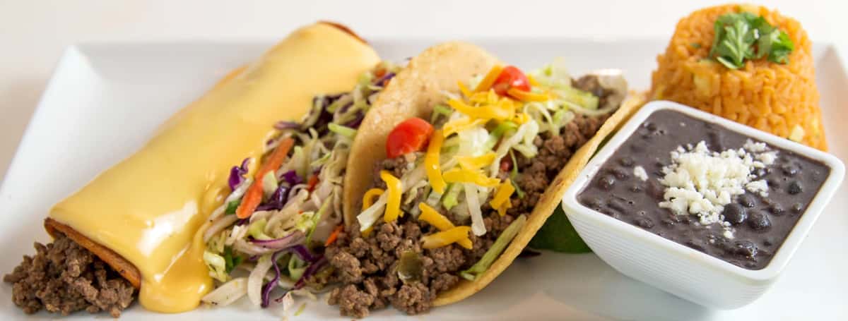 Mesero tacos with queso, rice, and beans showcasing Mexican cuisine for Hispanic Heritage Month.