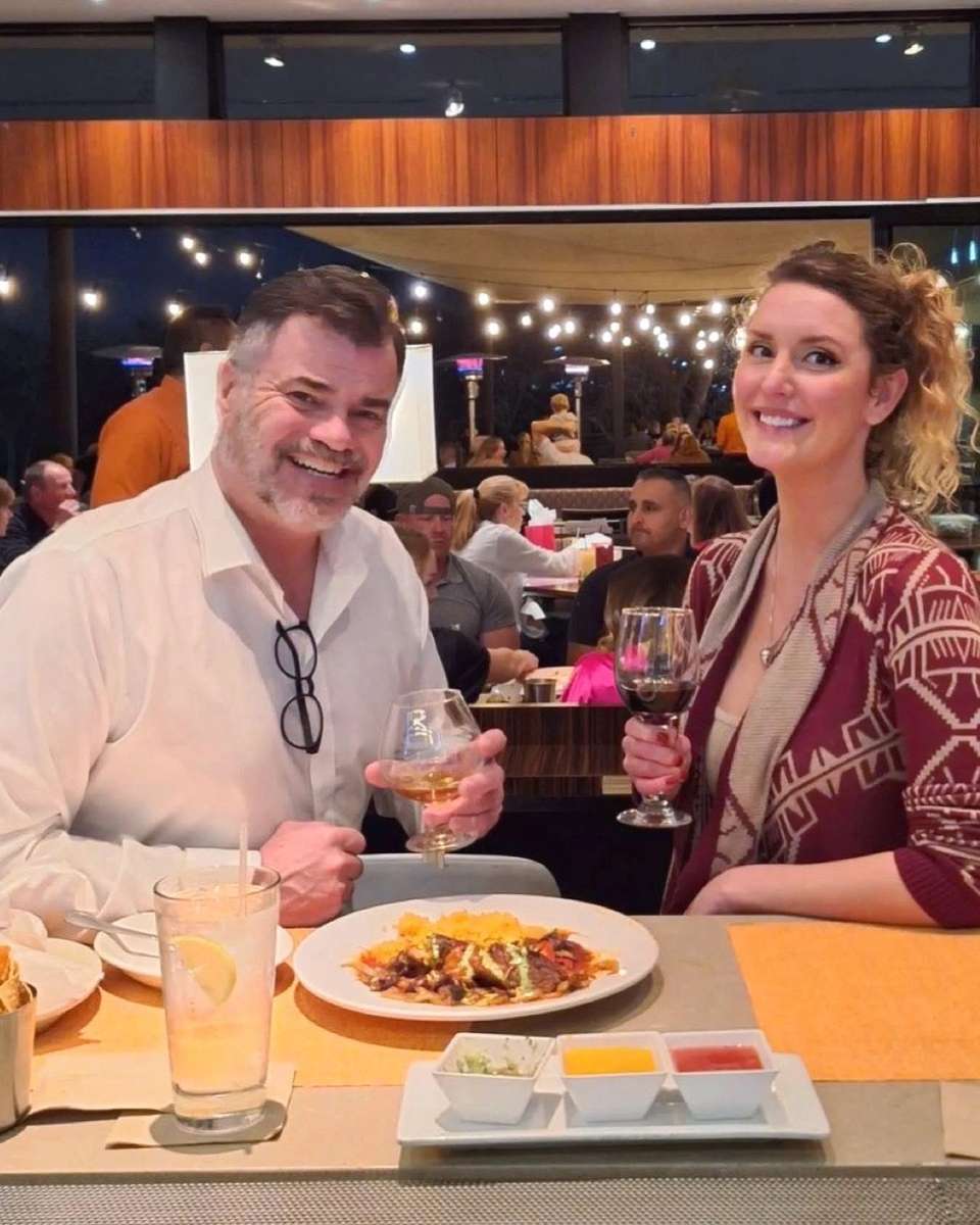 Couple enjoying drinks and Mexican food during date night at Mesero.