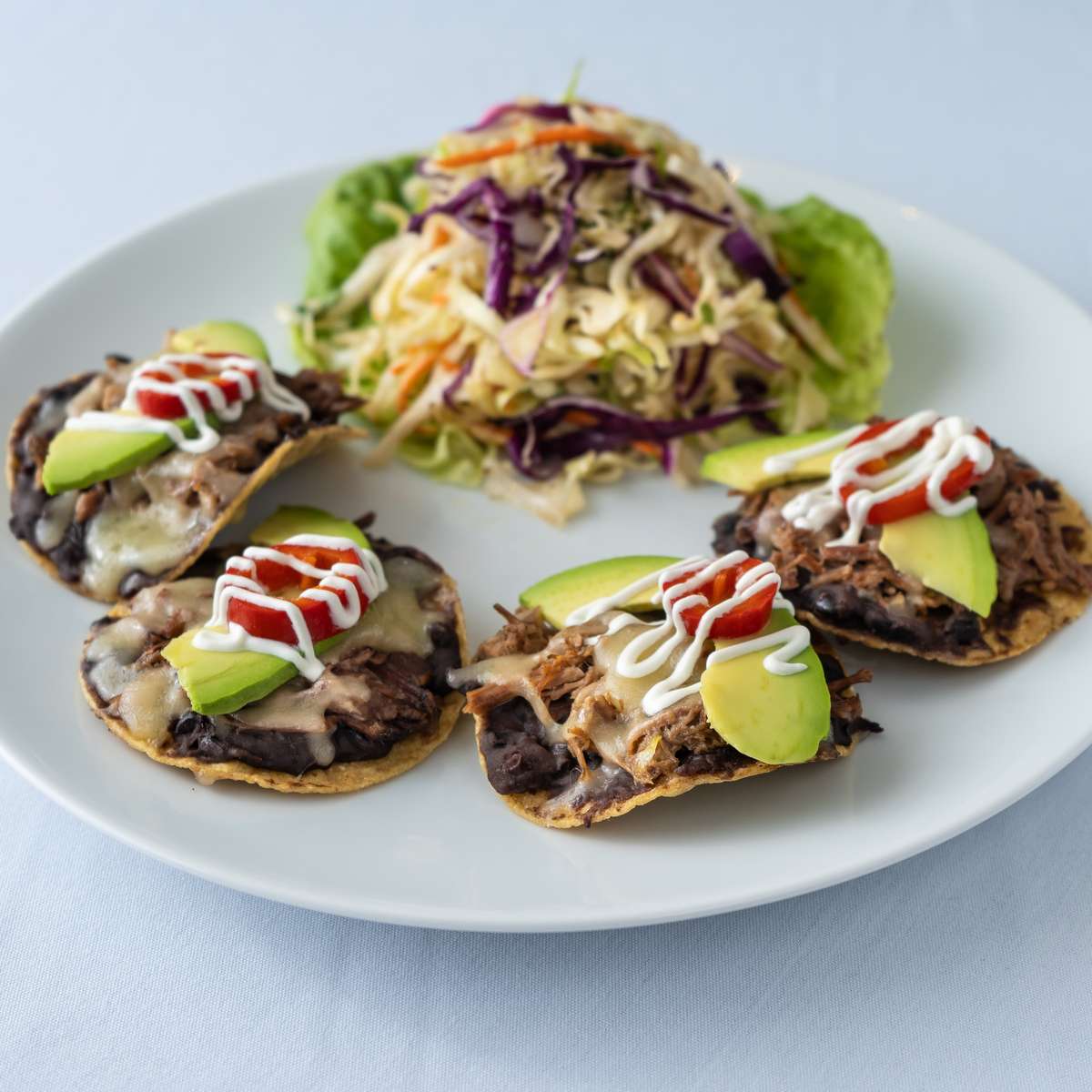 Mesero’s famous Nachos Conocidos is the kind of appetizer that prepares the table for the next course.