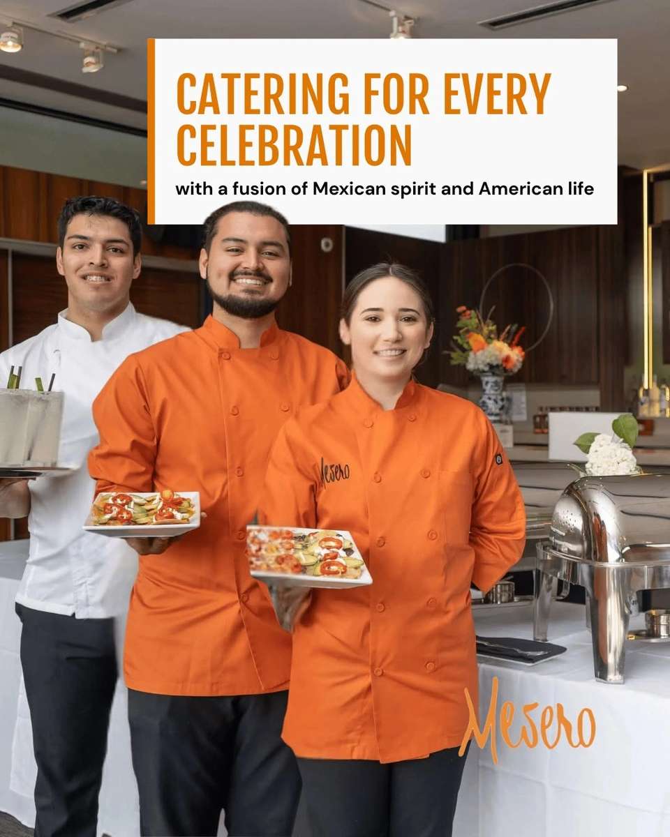 Mesero catering team holding plated dishes beside a setup for a birthday celebration.