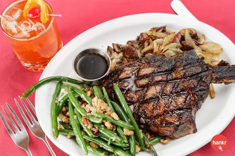 grilled steak with a side of green beans