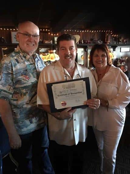 The Torrance Mayor Pat Furey, awarding Rick LoCoco the City of Torrance Certificate of Recognition
