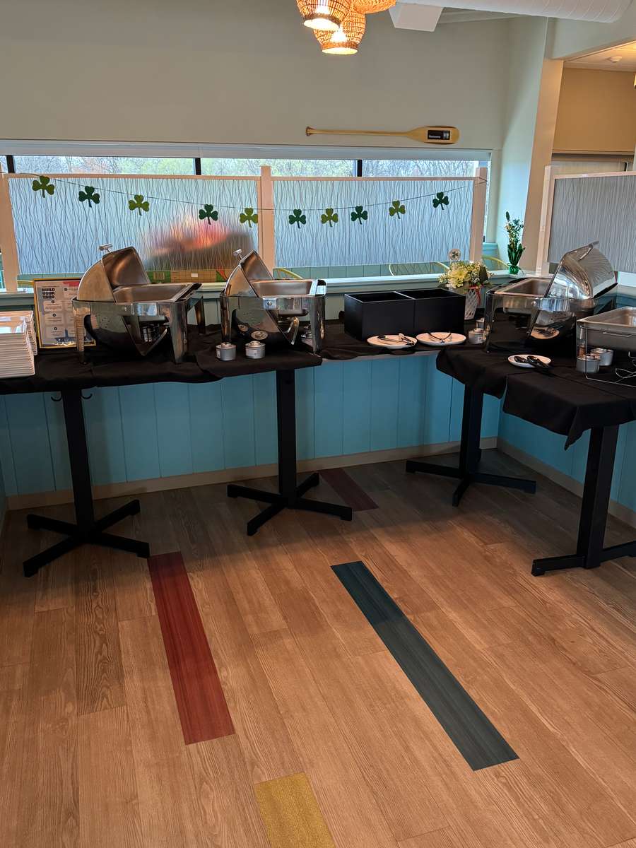 Buffet setup for group party at Palm & Paddle Grille