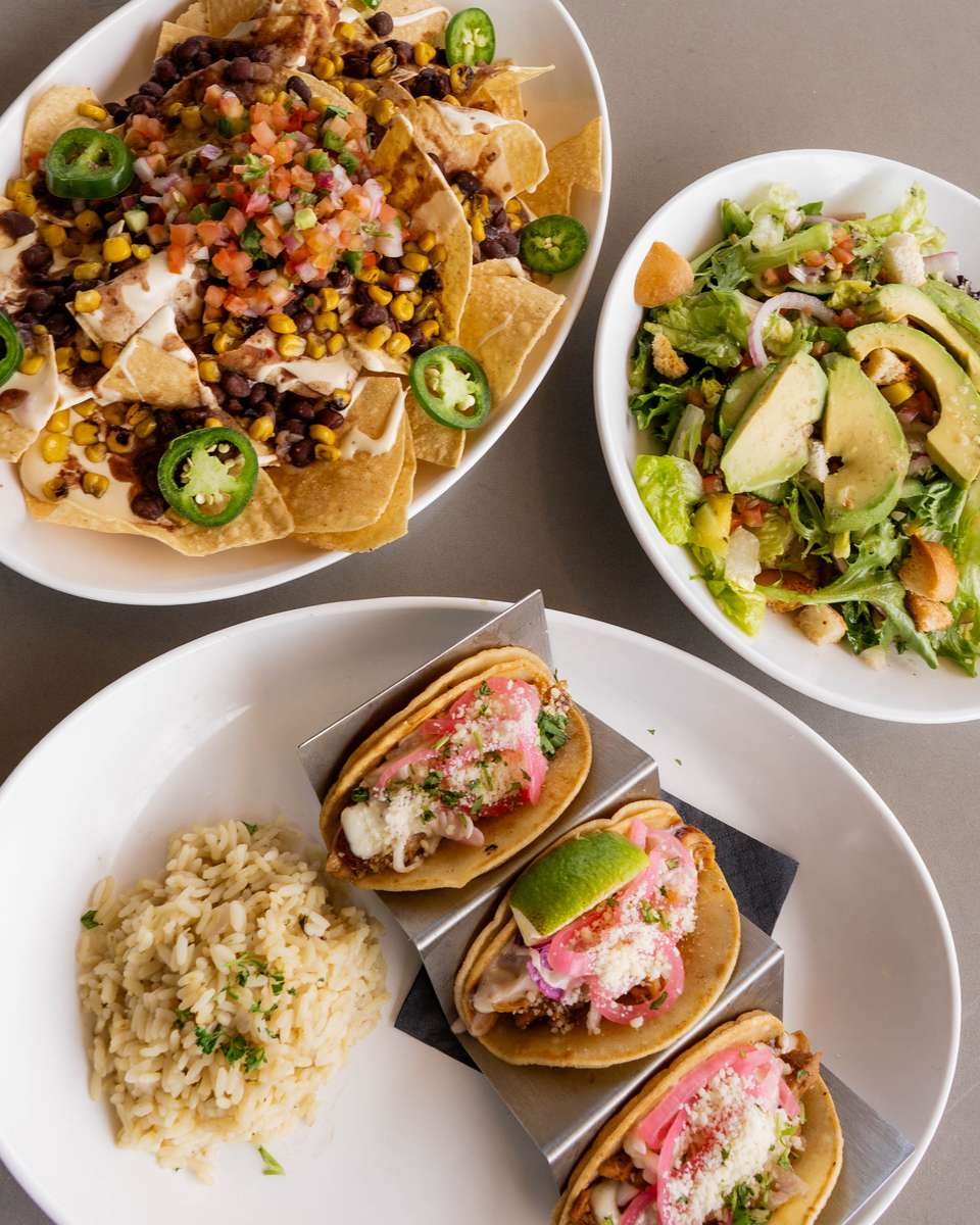 variety of food in plates on table