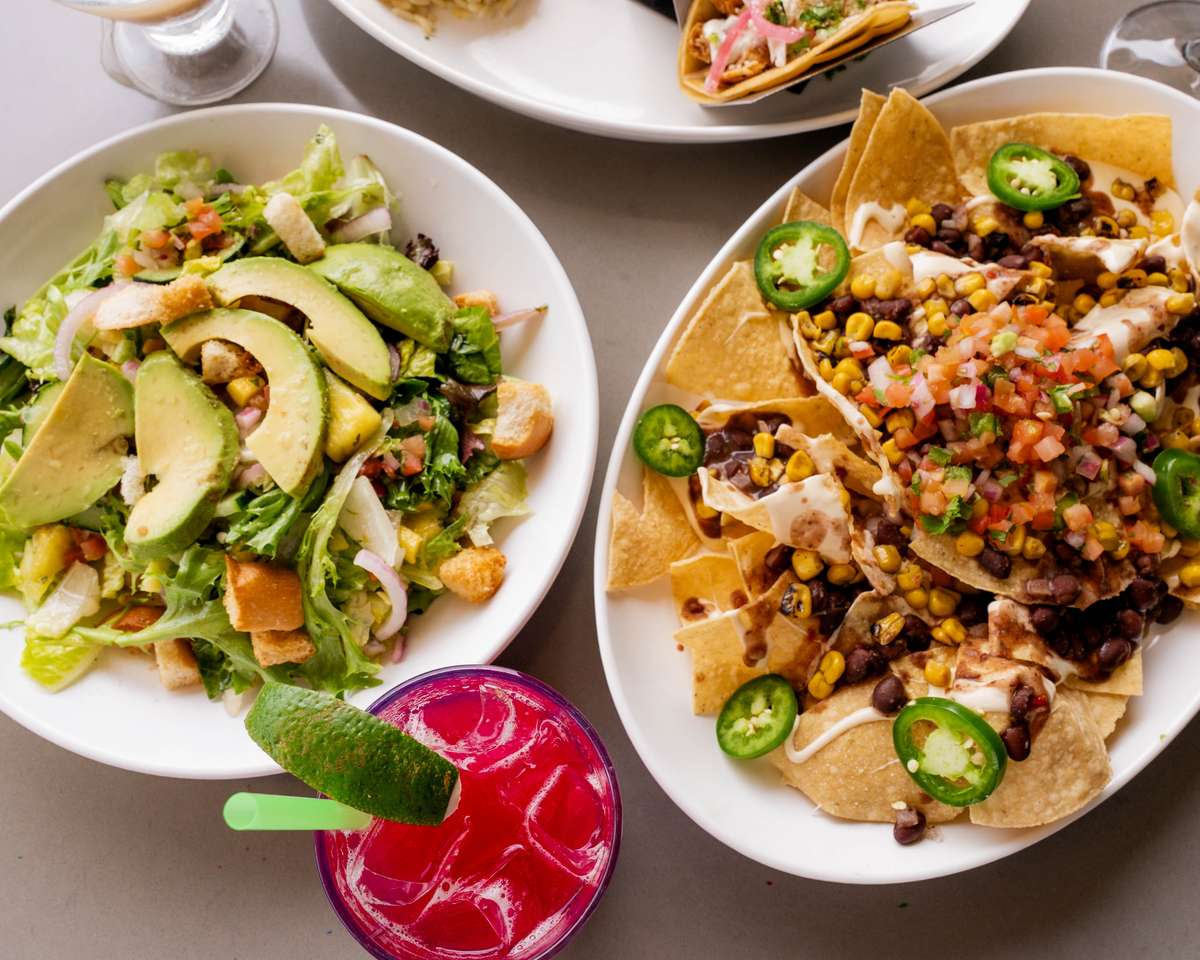 aerial view of a variety of colorful dishes on a table