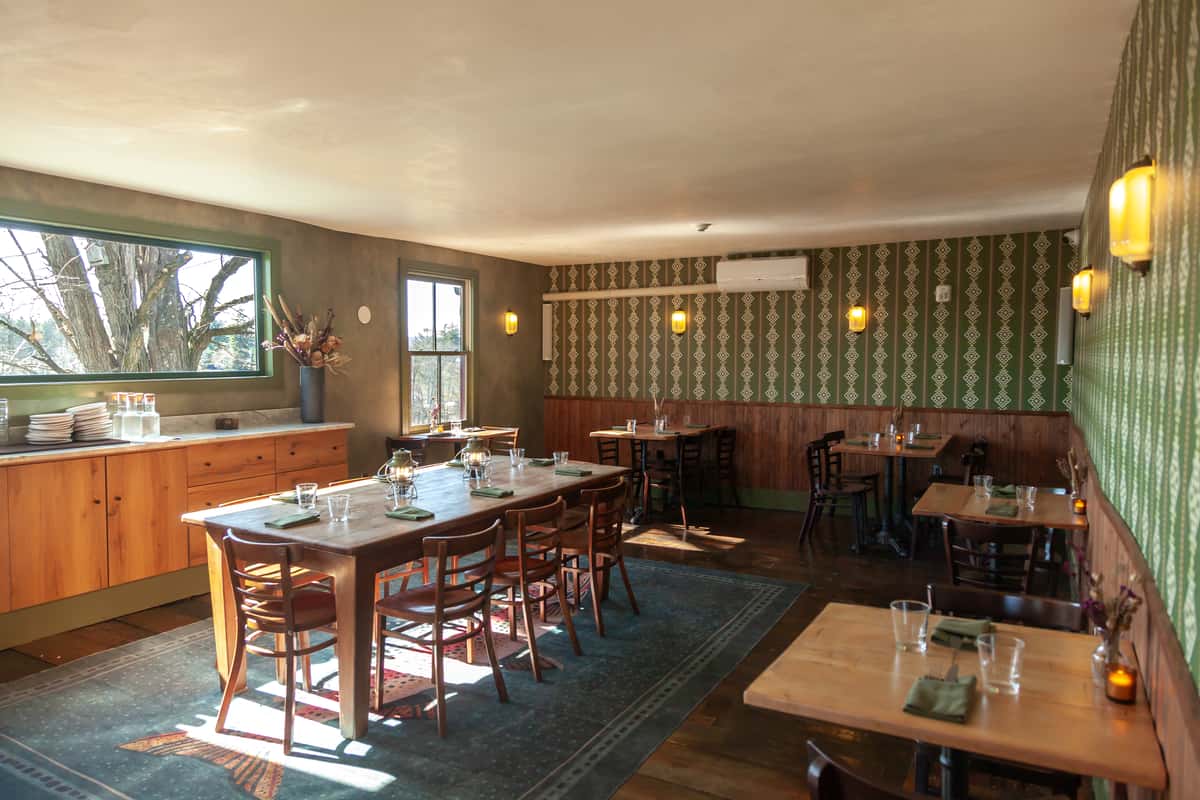 Private dining room showing tables, chairs, and decor