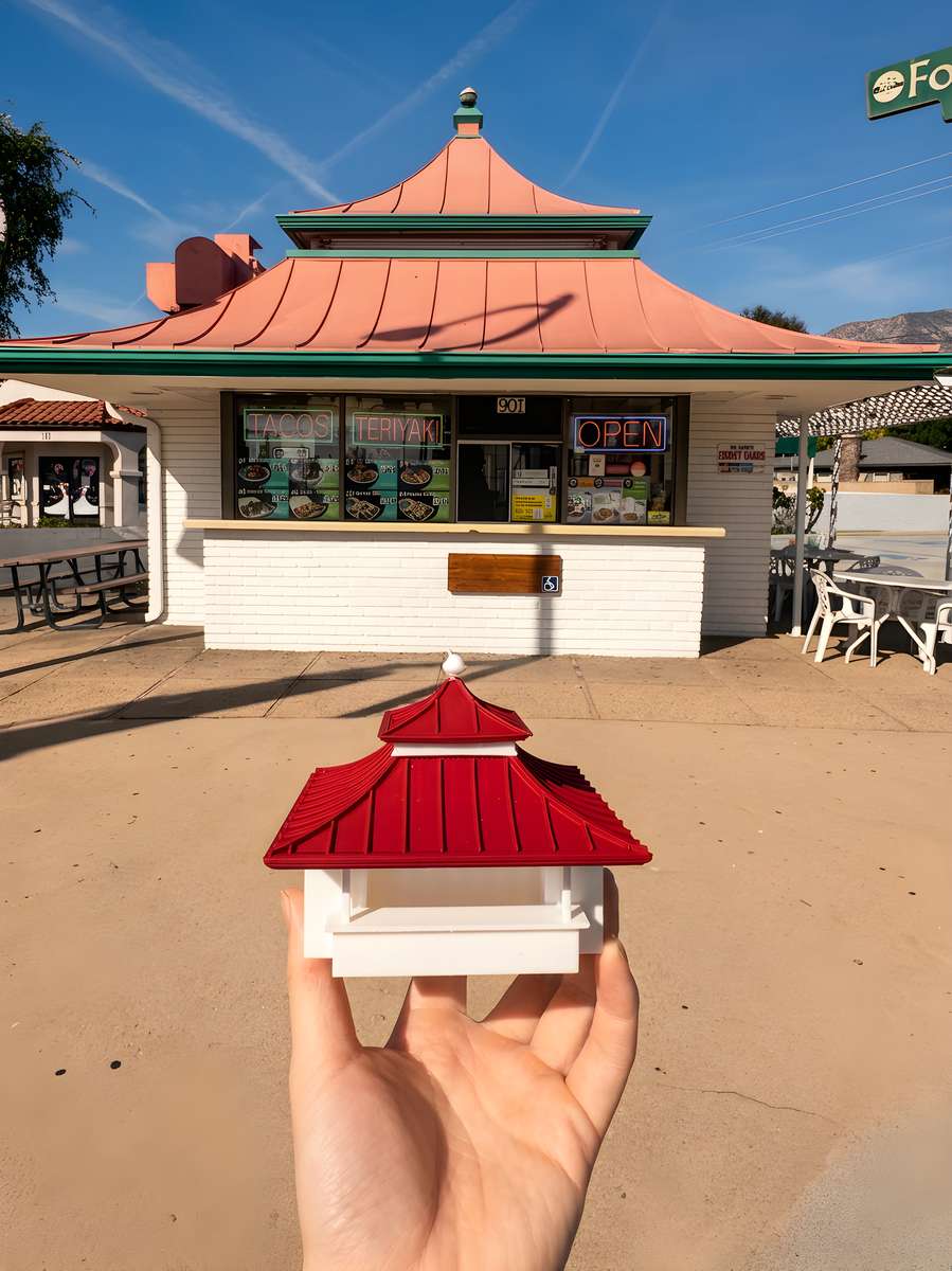 B&C Teriyaki restaurant exterior with Asian-inspired red roof, outdoor seating, and teriyaki and taco service windows