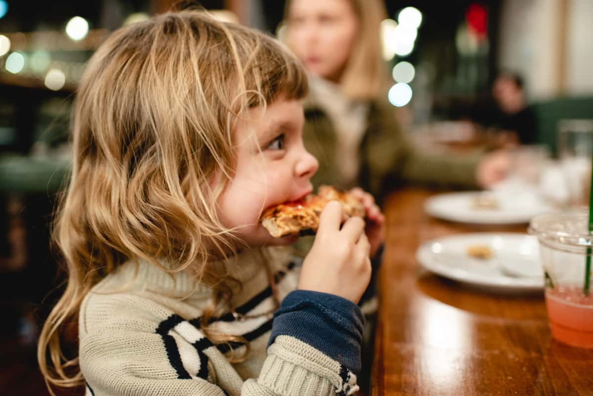 Kid Eating Pizza