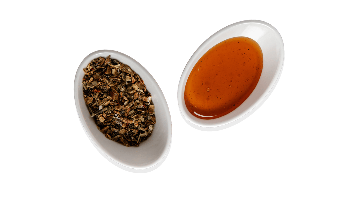 Hot honey and Italian seasoning in small bowls