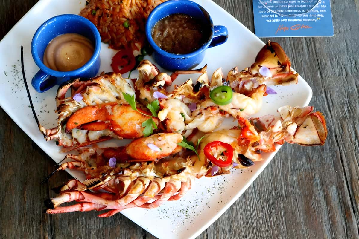Seafood platter featuring lobster tail, crab, shrimp, and house made dipping sauces.