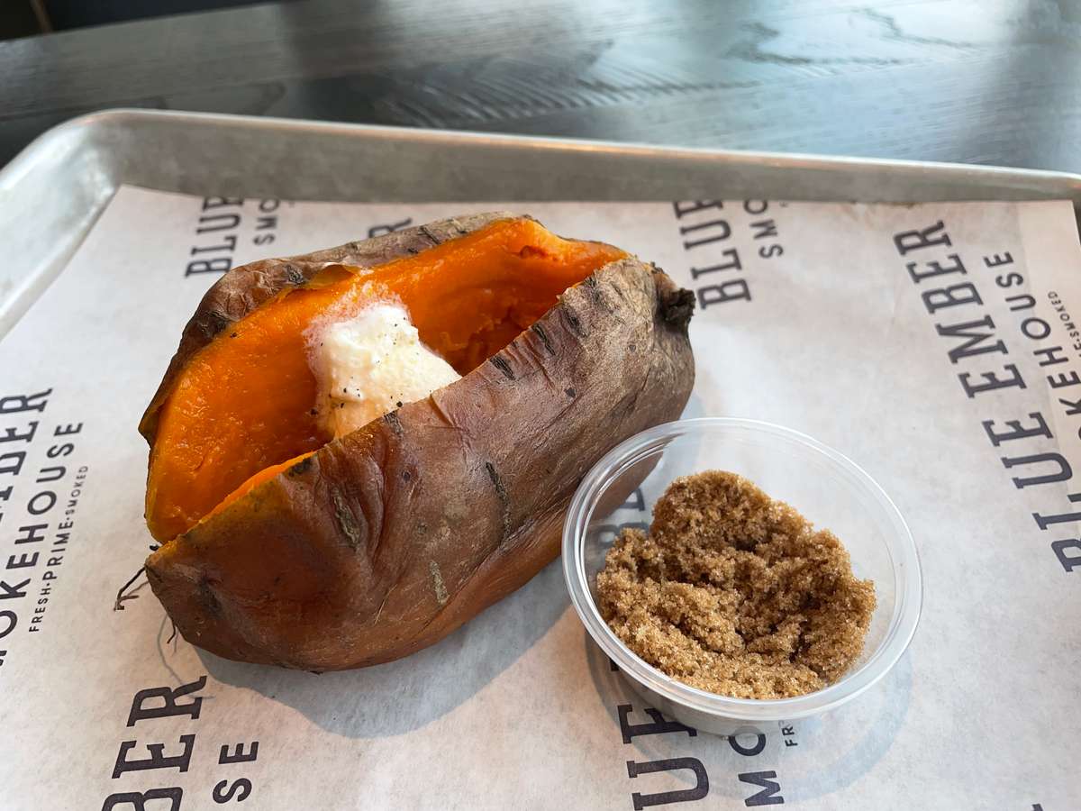 sweet potato with butter and sugar on the side