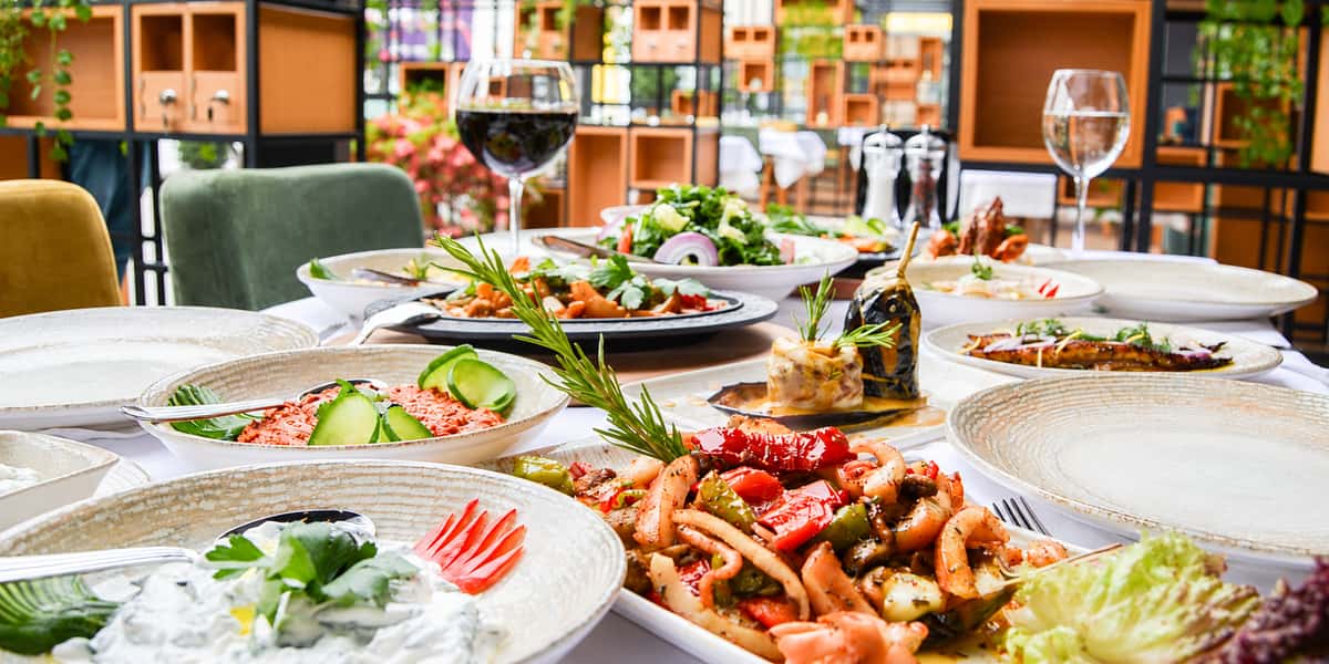 Mediterranean Feast in a Garden Bistro.png