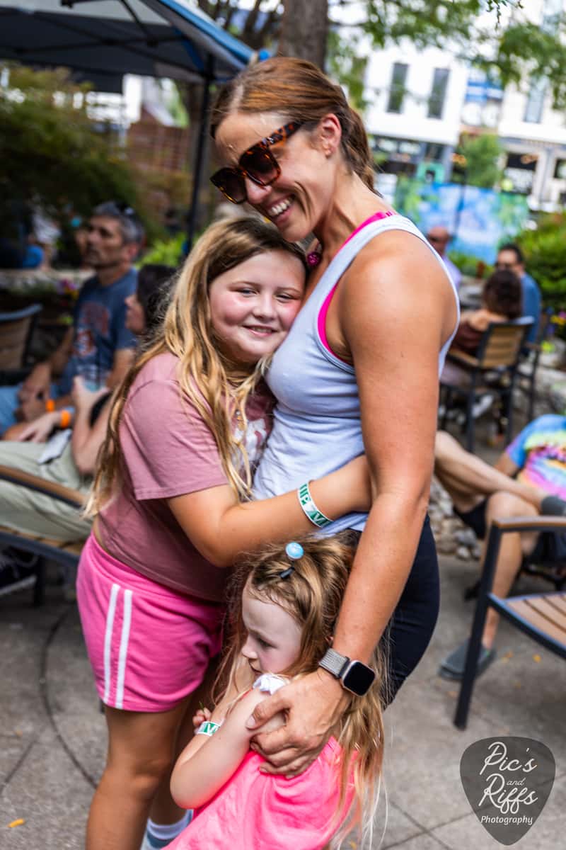 Family enjoying the all ages Island Rock Fest at Lou Lou on Market