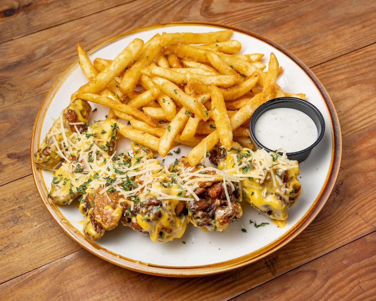 Saucy chicken with fries and sauce
